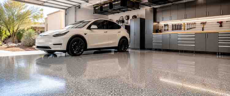 Luxury epoxy garage floor coating in Arizona featuring a modern residential garage with decorative flake flooring
